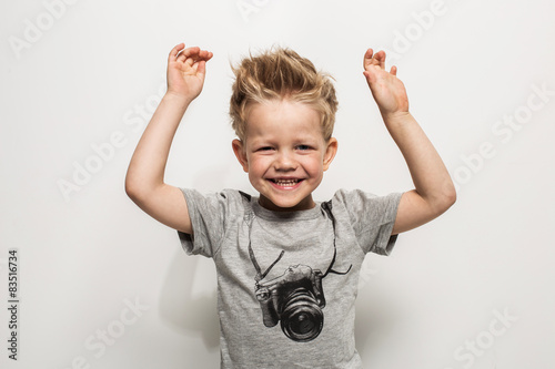 Portrait of happy joyful beautiful little boy  