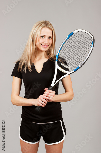 Blonde girl in black sportswear © Igor Butseroga