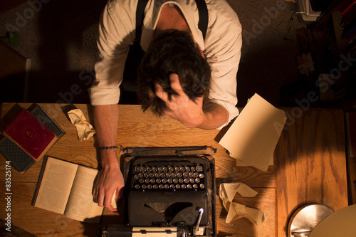 USA, Idaho, Bannock County, Pocatello, Writer sitting at desk unable to write photo