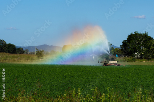 Australia, Queensland, Warwick, Colorful rainbow during irrigation