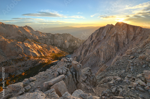 View of mountains against sky during sunrise photo