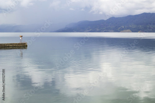 Indonesia, Sumatra, Lake Toba, Scenic view of small pier on lake photo