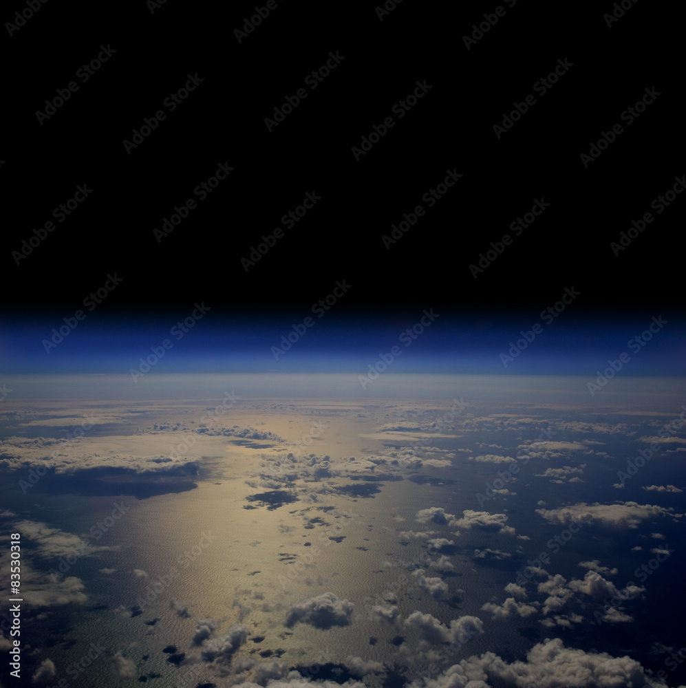 The Earth in space with clouds over the open sea. The Earth in space with clouds over the open sea.