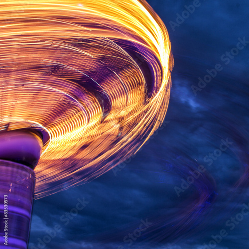 Blurred motion of side of carousel photo