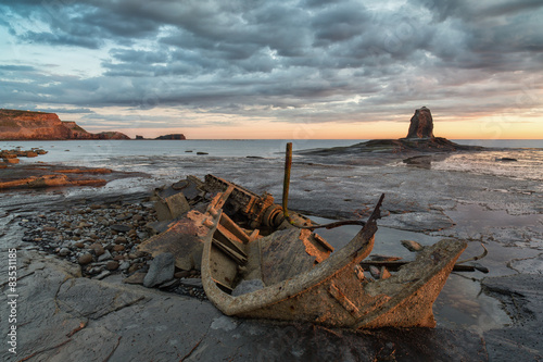 UK, England, Yorkshire, Sunrise at Saltwick Bay photo