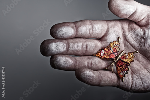 USA, Idaho, Ada County, Boise, Man holding hand made butterfly gift in hand photo