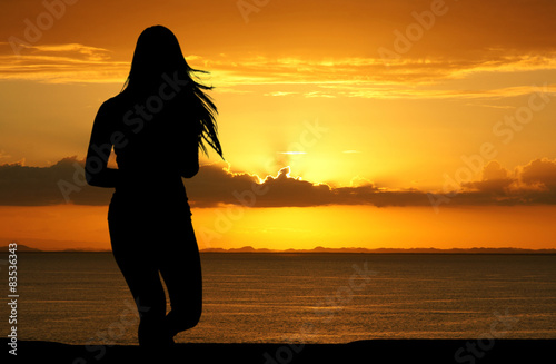 Woman Working Out At Beach