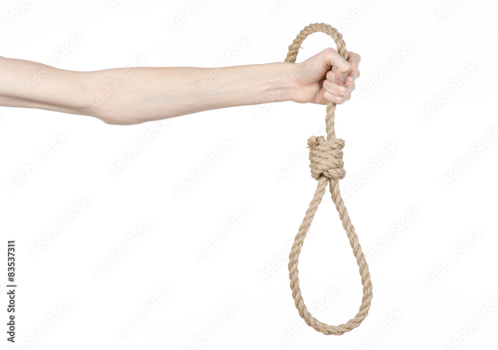 man's hand holding a loop of rope for hanging on isolated man's hand holding a loop of rope for hanging on isolated