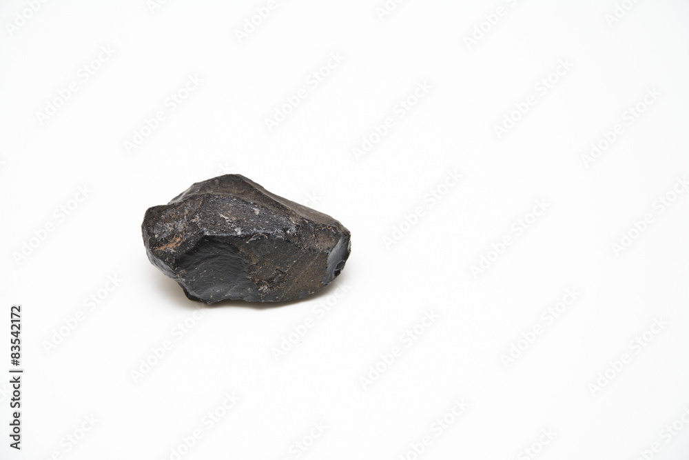 black stone on a white background black stone on a white background