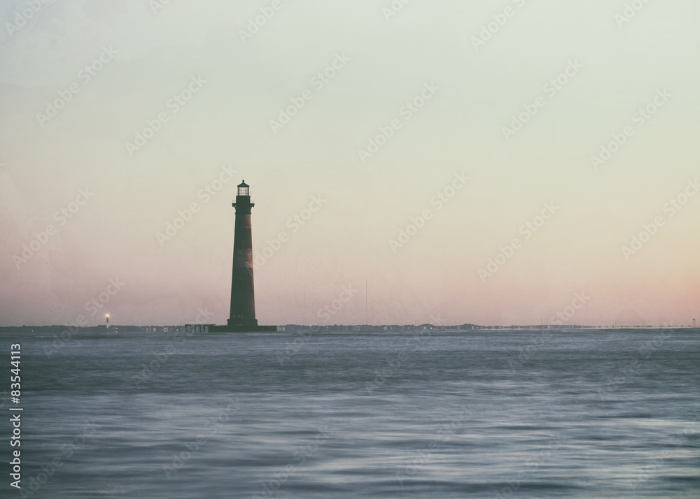 Vintage style photo of Morris Island Lighthouse at sunrise