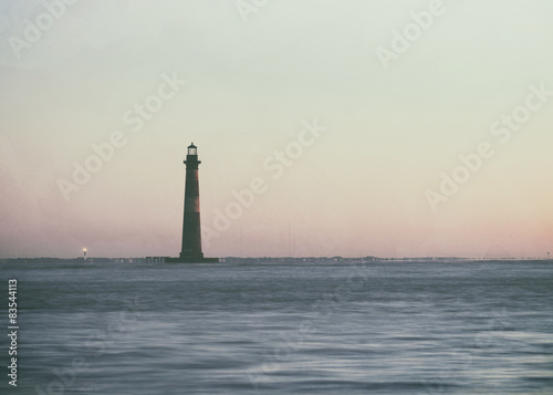 Vintage style photo of Morris Island Lighthouse at sunrise
