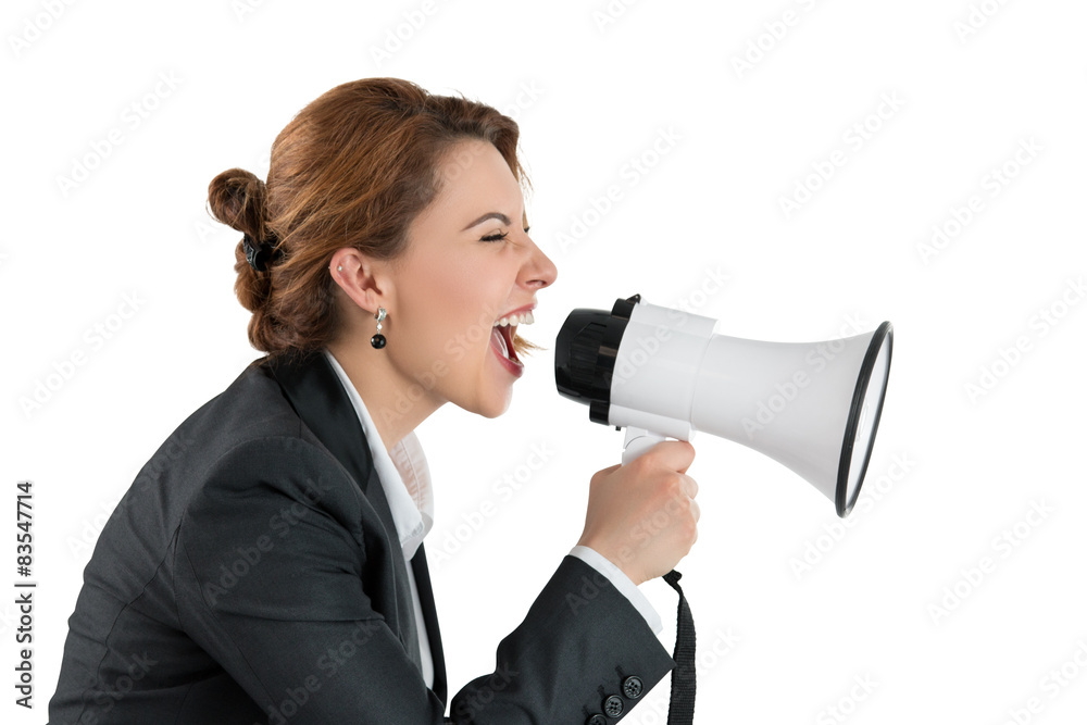 Funny business woman shouting with a megaphone Funny business woman shouting with a megaphone