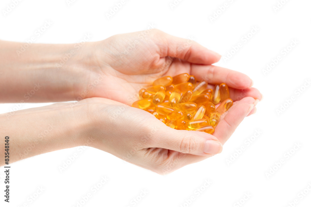 Fototapeta premium Omega 3 in female hands.