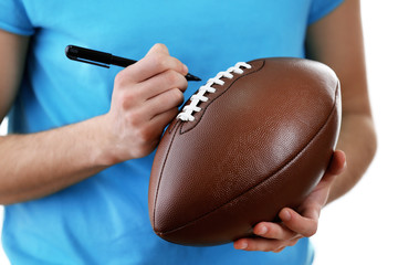 Autographs by American football star isolated on white background