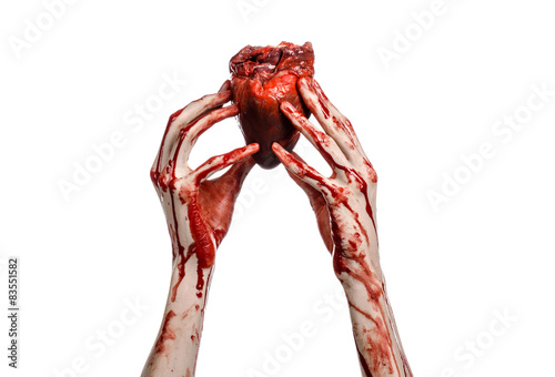 terrible bloody hand hold torn bleeding human heart isolated