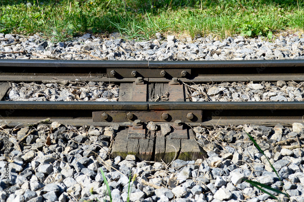 Eisenbahnschiene mit Schienenbefestigung Stock Photo | Adobe Stock