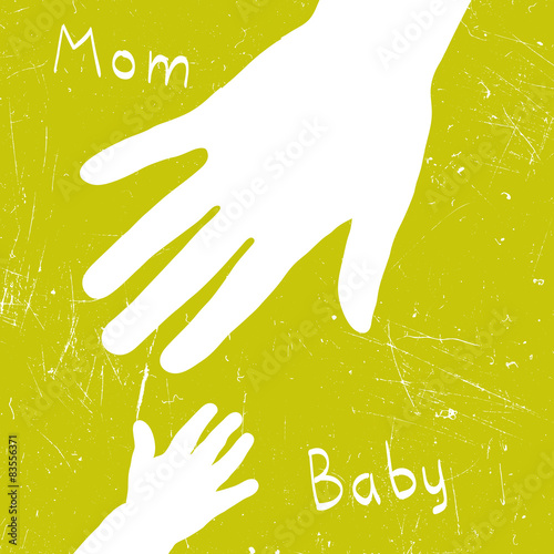 Mom's hand takes baby