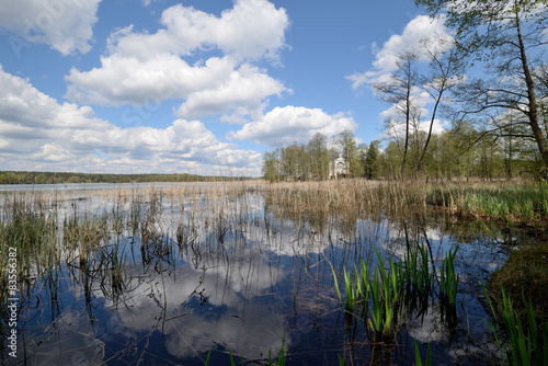 Fototapeta Naklejka Na Ścianę i Meble -  Reflexion of clouds in the spring lake