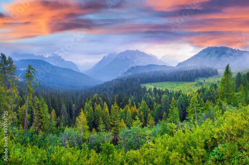 Dramatic summer sunrise in the italian Alps