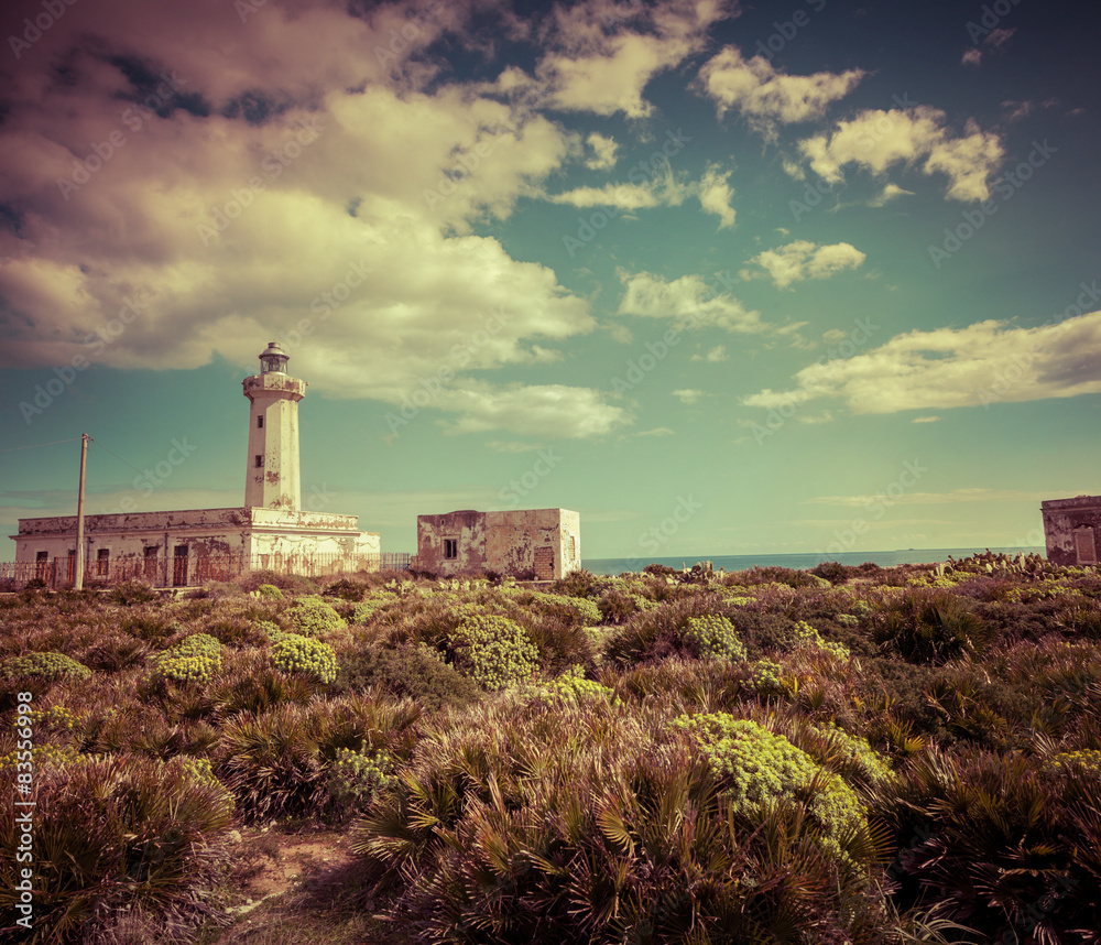 Old lighthouse on the Murro di Porco cape