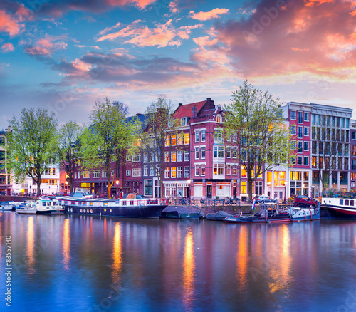 Colorful spring sunset on the canals of Amsterdam © Andrew Mayovskyy