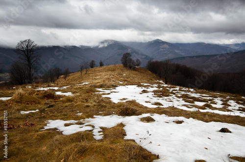 Snowy stormy mountains photo