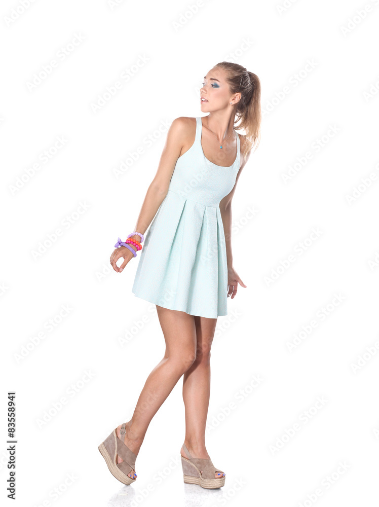 Young woman standing full length isolated on white background Young woman standing full length isolated on white background