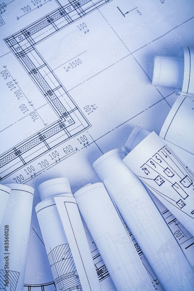 rolled blueprints with organized copyspace rolled blueprints with organized copyspace