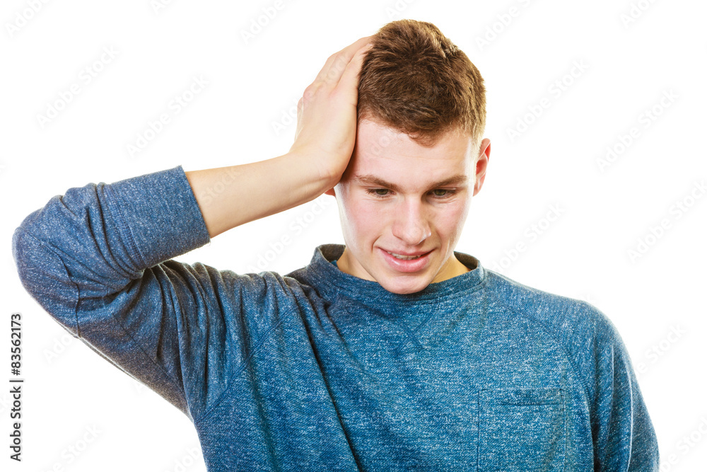 Closeup stressed man holds head with hands Closeup stressed man holds head with hands