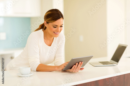 young woman using tablet computer