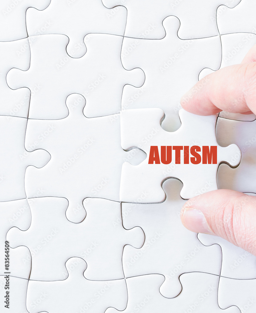 Missing jigsaw puzzle piece with word AUTISM
