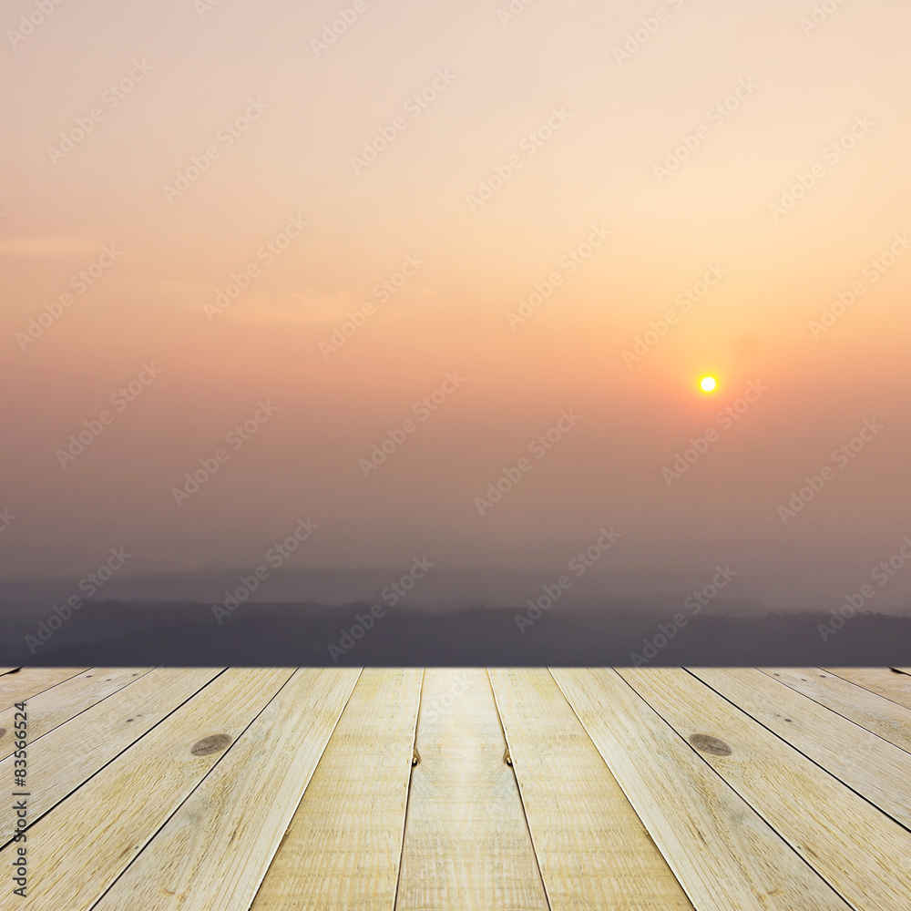 Wood terrace and beautiful sunset
