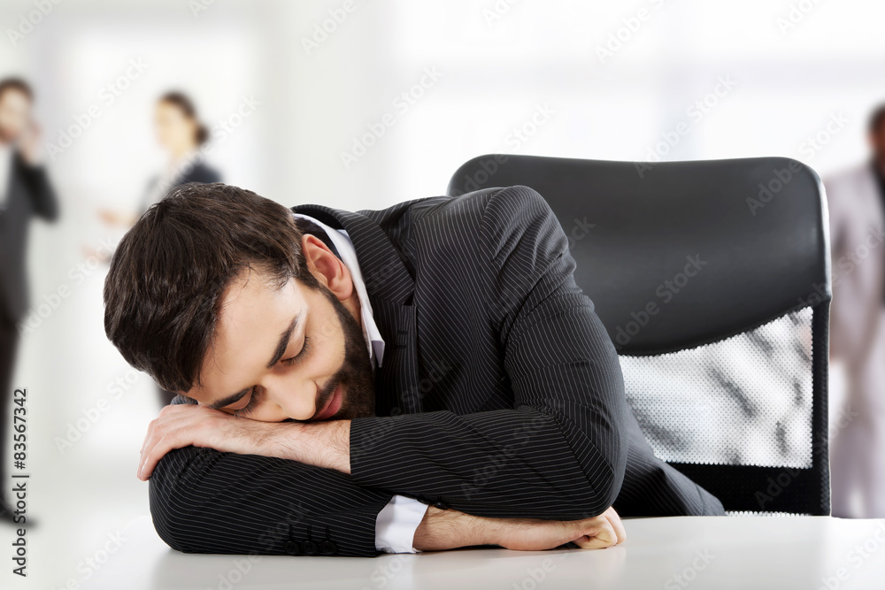 Fototapeta premium Tired handsome businessman.