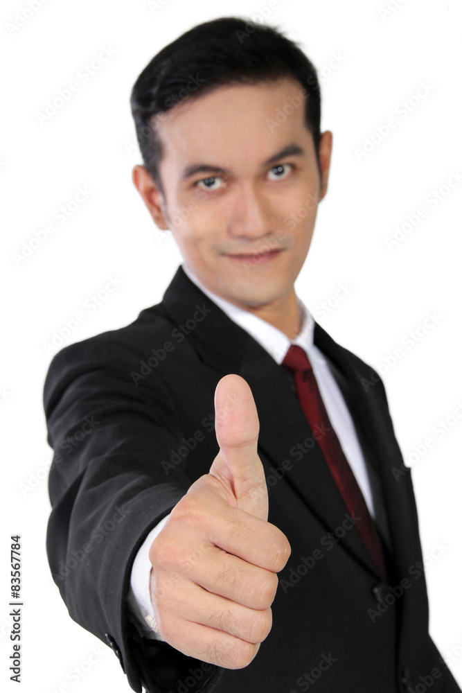 Young Asian businessman giving thumb up, isolated on white Young Asian businessman giving thumb up, isolated on white
