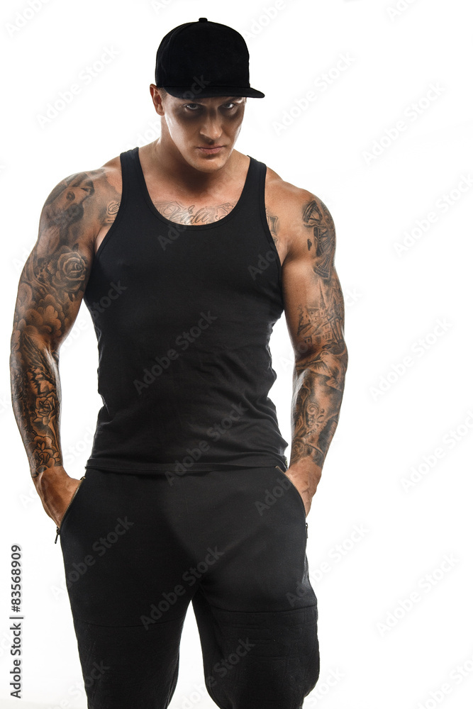 Modern muscular guy with tattooes Modern muscular guy with tattooes