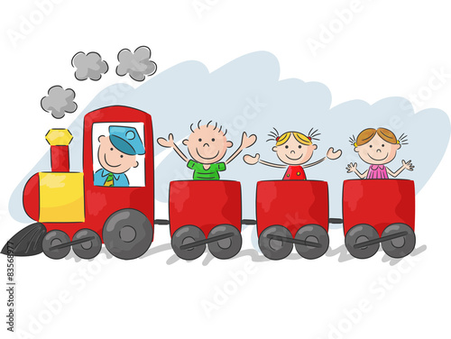 Happy little kids on a colorful train