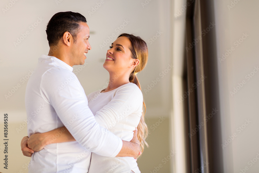 mid age couple embracing mid age couple embracing