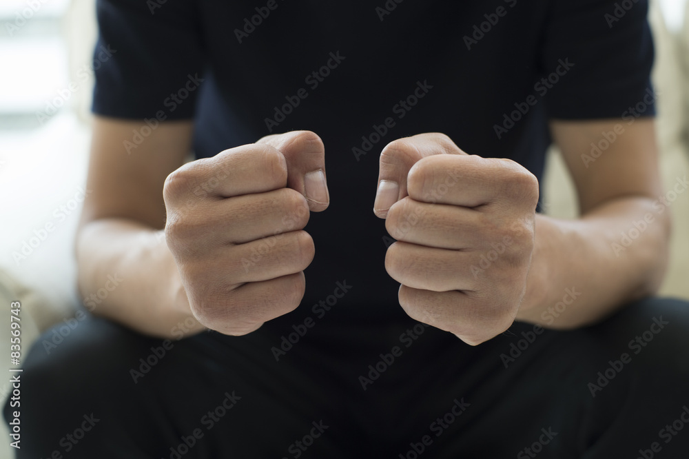 Men are holding hands