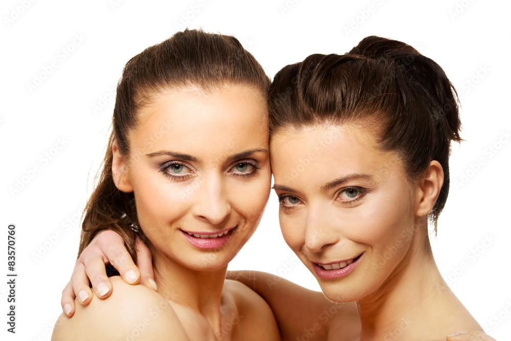 Two sisters with make up embracing. Two sisters with make up embracing.