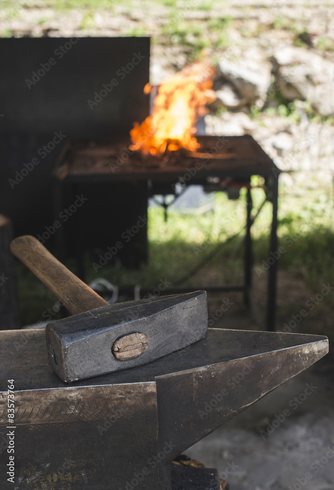 Vise and anvil in a forge shop Vise and anvil in a forge shop