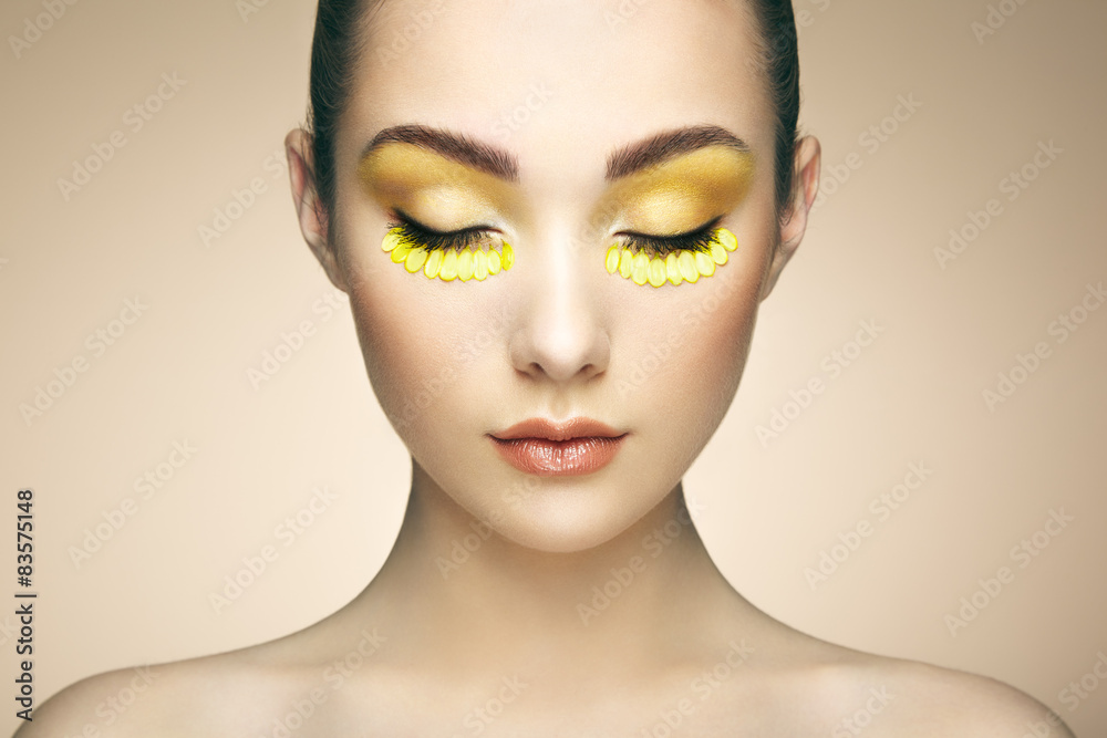 Face of beautiful woman decorated with flowers Face of beautiful woman decorated with flowers