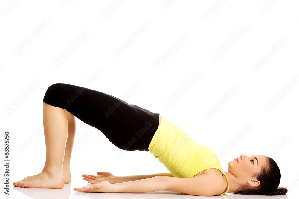 Woman doing stretching exercise. Woman doing stretching exercise.