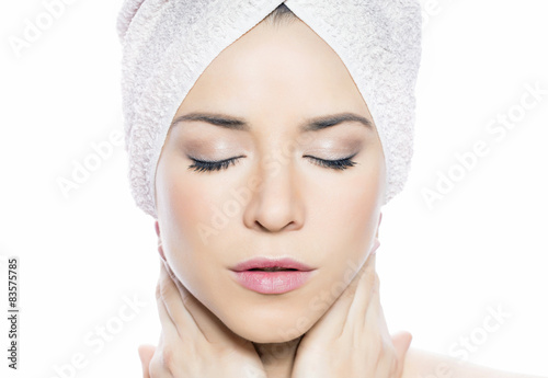 Beauty portrait of a woman with a towel