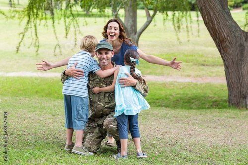Handsome soldier reunited with family  © WavebreakmediaMicro