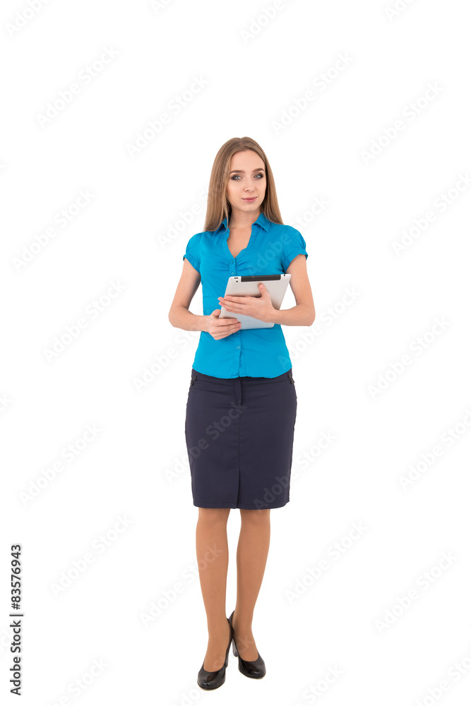 Young beautiful businesswoman holding digital tablet in her hand