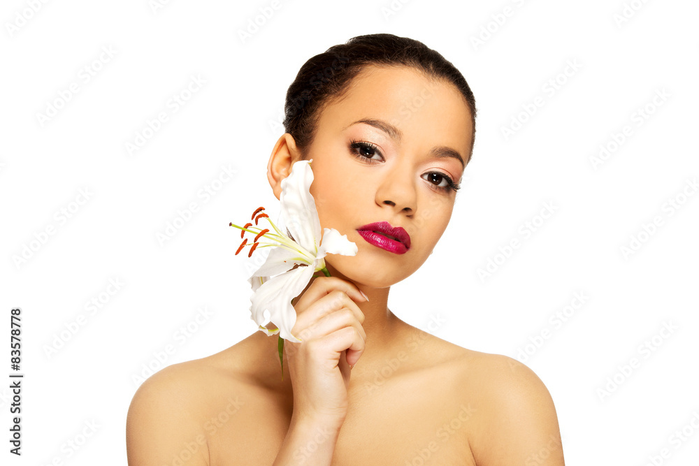 Beauty face of woman with lily flower. Beauty face of woman with lily flower.