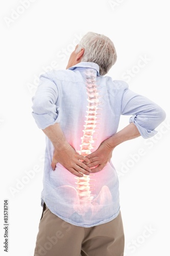 Canvas Print Highlighted spine of man with back pain