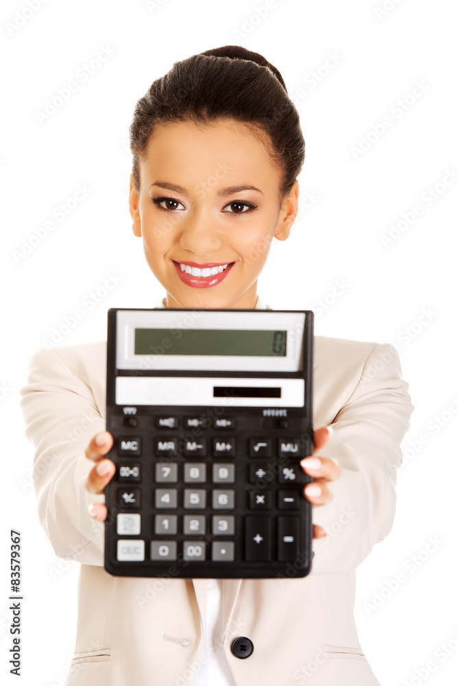 Smiling business woman with a calculator. Smiling business woman with a calculator.
