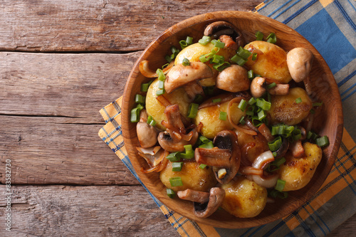 Homemade Food: Potatoes with mushrooms. top view
