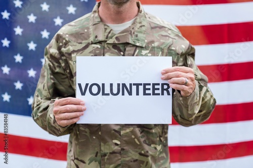 American soldier holding recruitment sign